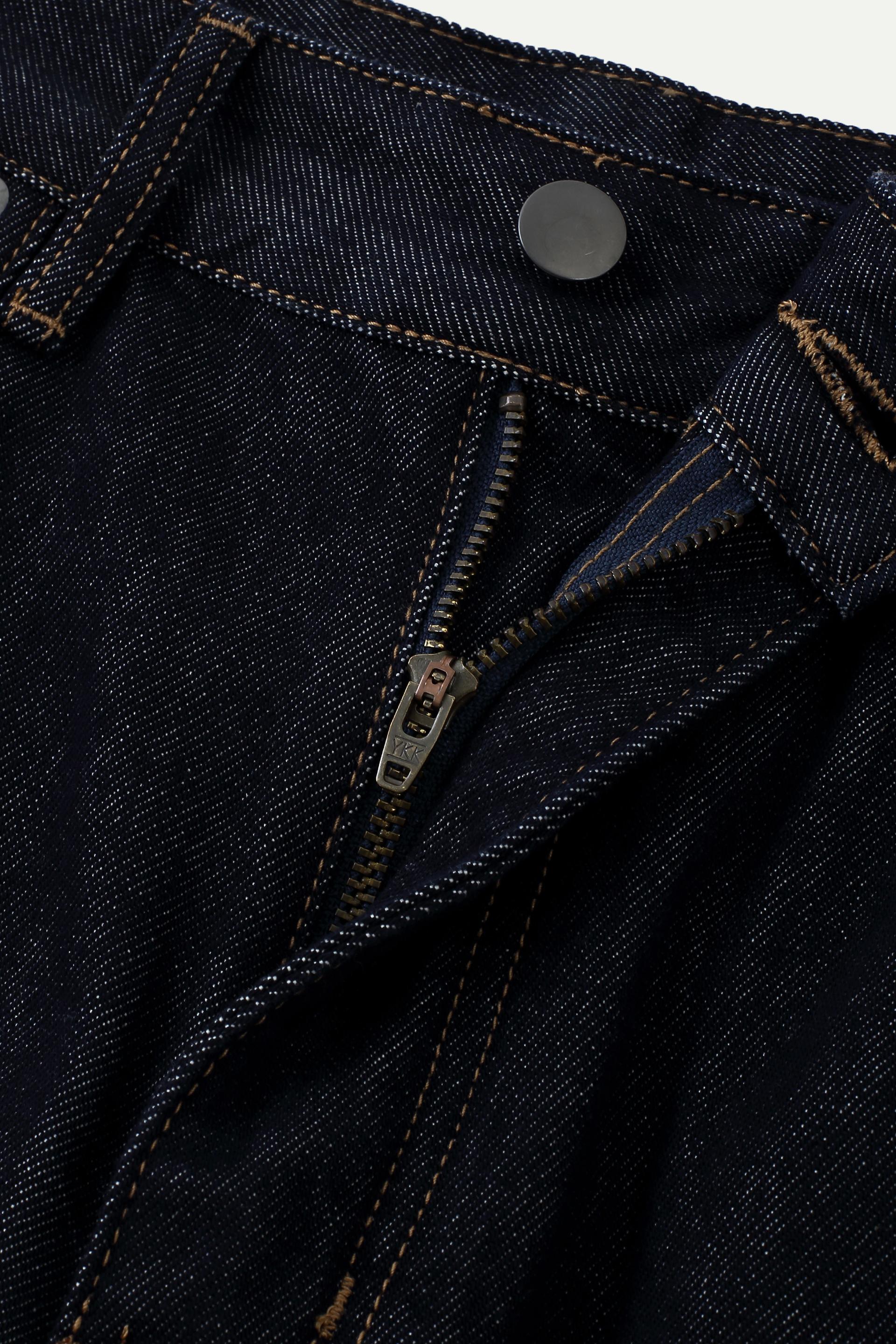 Dark Wash Balloon Leg Jeans with Suede Pocket Detail